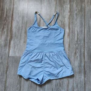 NWT Luminary Activewear Romper Crisscross Back Round Neck Baby Blue Pocket Sz L